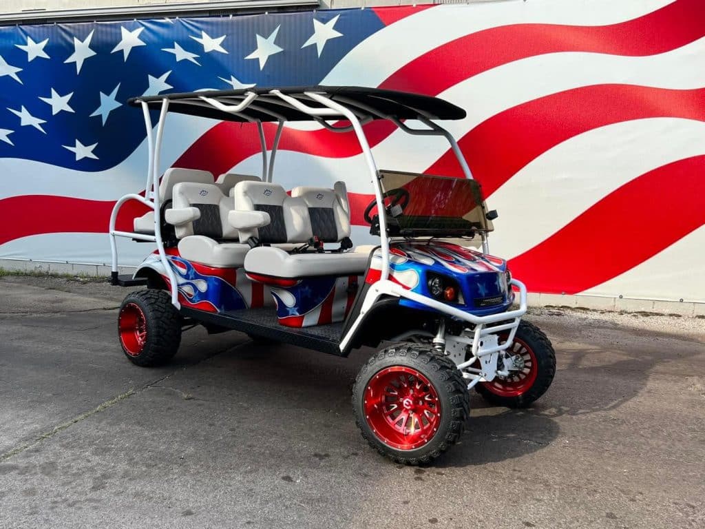 Custom Red, White and Blue Golf Cart built by Glenn's Golf Car located in Painesville Ohio.